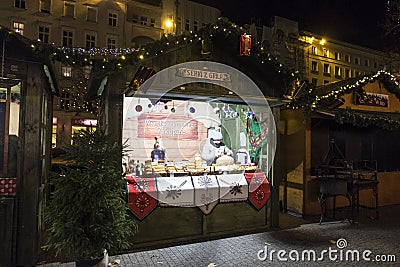 Saleswoman in Christmas kiosk. Poznan Bethlehem or Poznan Christmas Market. Poland Editorial Stock Photo