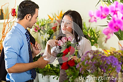 Saleswoman and customer in flower shop Stock Photo