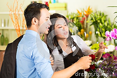 Saleswoman and customer in flower shop Stock Photo