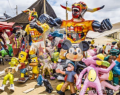 Salinas, Ecuador - December 31, 2015 - Manijotes, or paper mache manniquins are made to be burned at midnight on New Years Eve Editorial Stock Photo