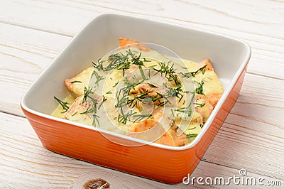 Salmon baked with cheese sauce and leek. Stock Photo