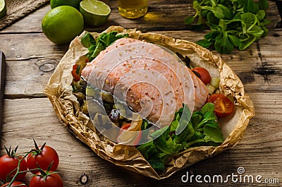 Salmon baked in papillote Stock Photo