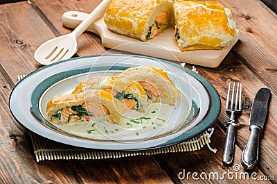 Salmon baked in puff pastry Stock Photo