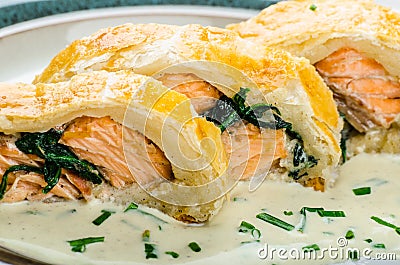 Salmon baked in puff pastry Stock Photo