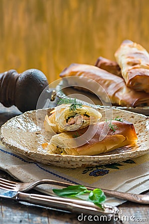 Salmon and basil butter filo parcels Stock Photo