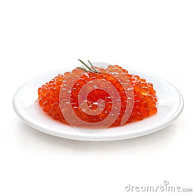 Salmon caviar on a ceramic plate Stock Photo