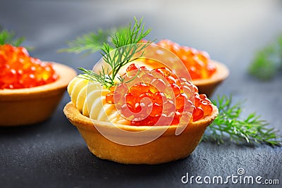 Salmon caviar. Tartlets with red caviar. Gourmet food. Seafood. Trout caviar Stock Photo