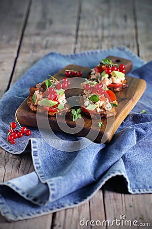 Salmon ceviche on tostones or fried plantain, appetizer Stock Photo