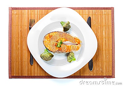 Salmon meat with delicious broccoli on white plate Stock Photo