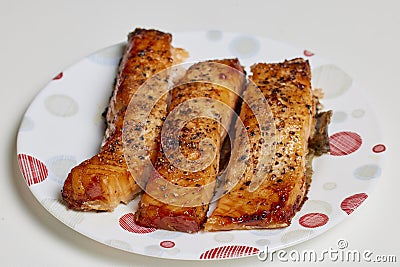 salmon prepared in the oven on a plate Stock Photo