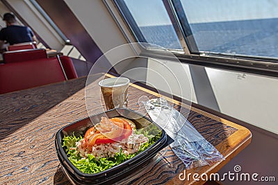 Salmon sandwich, coffee in disposable bowl breakfast travel concept Stock Photo