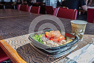 Salmon sandwich, coffee in disposable bowl breakfast travel Stock Photo