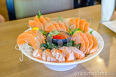 Salmon sashimi set on white bowl Selective focus Stock Photo