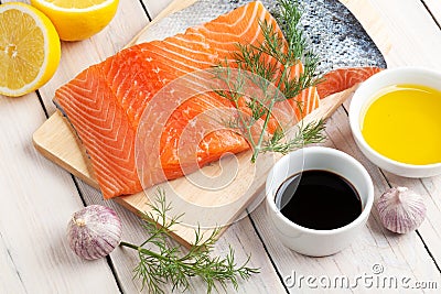 Salmon, spices and condiments Stock Photo