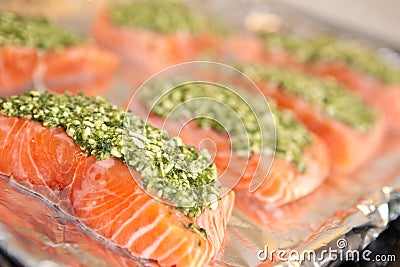 Salmon steak with fresh basil pesto Stock Photo