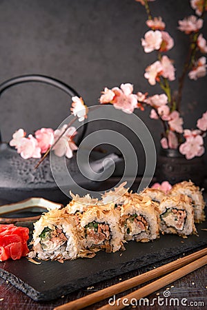 Salmon Sushi Roll In Tuna Flakes Sushi menu. Stock Photo