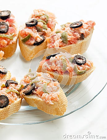 salmon tartare with capers and black olives Stock Photo