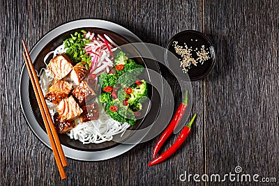 Salmon teriyaki with rice noodle and vegetables Stock Photo