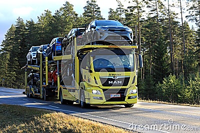 Yellow MAN TGS 18.420 Car Carrier Hauls New Cars Editorial Stock Photo