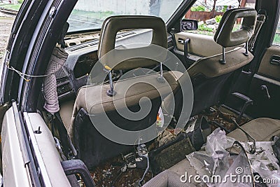 Salon of an old broken abandoned car Stock Photo