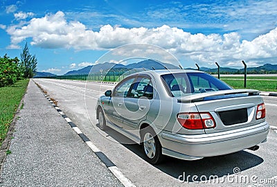 Saloon car on the road Stock Photo