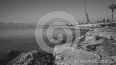 Salou, Tarragona. B/W welcome sign of Salou over the rocks Editorial Stock Photo