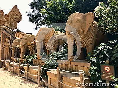 Salou, Spain, June 2019 - A large elephant standing in a garden Editorial Stock Photo
