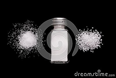 Salt on a black background. Salt crystals Stock Photo