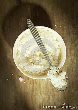 Salt bowl and spoon. Stock Photo