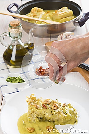 Salt cod in a pilpil sauce Stock Photo