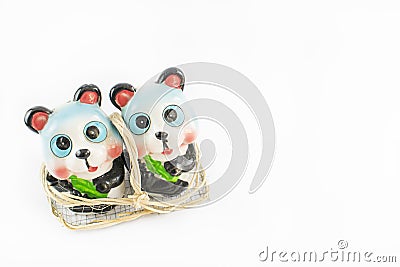 Salt and pepper bowl with a teddy bear. Stock Photo