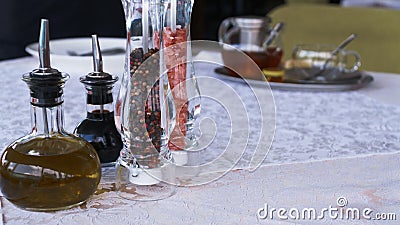 Salt and pepper on the white table in the restaurant Stock Photo