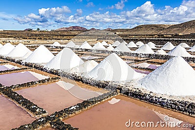 Salt piles in the saline of Janubio Stock Photo