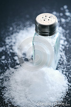 Salt and salt shaker, glass, seasoning, saltiness Stock Photo