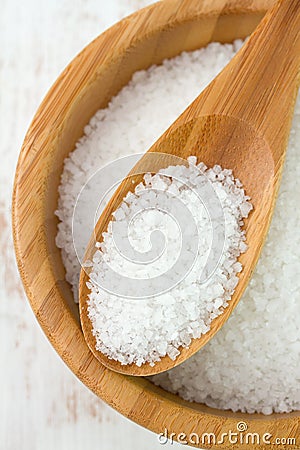 Salt in bowl with spoon Stock Photo