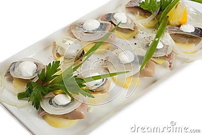 Salted herring fillet with potatoes Stock Photo