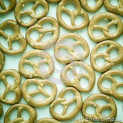 Salted pretzels on white as food background Stock Photo