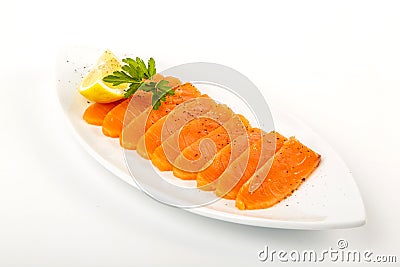 Salted salmon with butter and lemon. Plate on a white background Stock Photo