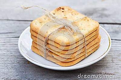 Saltine crackers on a plate on white table Stock Photo