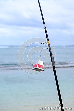 Saltwater Fishing Pole and Ocean Stock Photo