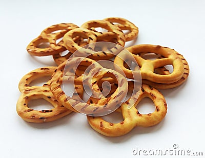 Salty crispy cracker mini pretzels on white background Stock Photo