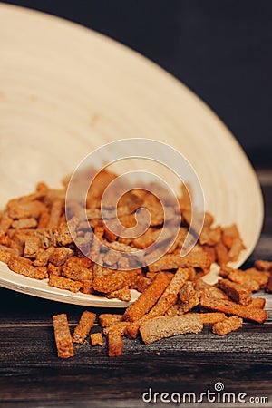 salty croutons snacks delicacy meal wooden table Stock Photo