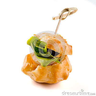 Salty profiterole appetizer with salad leave Stock Photo