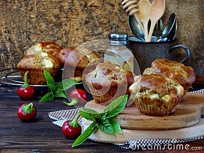 Salty snack muffins with feta, pepper and basil Stock Photo