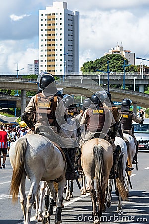 Military police cavalry doing security outside the football stadium for Bahia vs Vitoria game in Salvador, Bahia Editorial Stock Photo