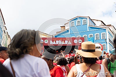 Hundreds of people are seen praying during a tribute to Santa Barbara in Pelourinho, city of Salvador, Bahia Editorial Stock Photo