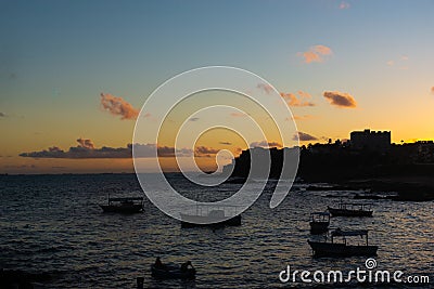 Beautiful colorful sunset with clouds on the Rio Vermelho beach in Salvador, Bahia Editorial Stock Photo