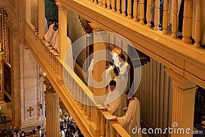 Choir singers participate in the corpus christi mass at the cathedral basilica of Salvador, in Pelourinho, Bahia Editorial Stock Photo