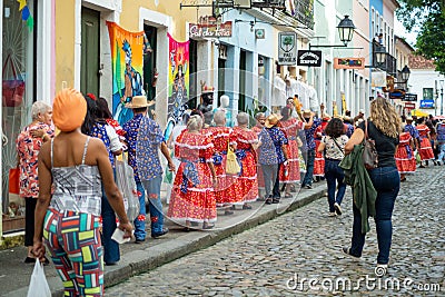 People are seen in the streets of Pelourinho dressed in costume for the feast of Sao Joao Editorial Stock Photo