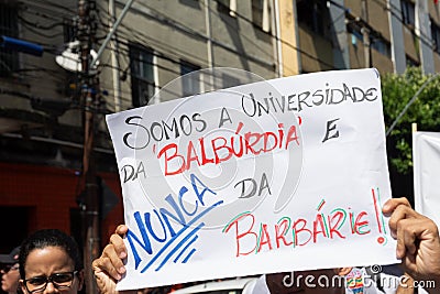 Protest by college students against money cuts in Brazilian education by President Jair Bolsonaro in the city of Salvador, Bahia Editorial Stock Photo